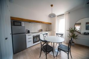 Appartements Appartement avec jardin : photos des chambres