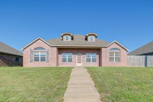 Central Bentonville Home with Fenced Yard!