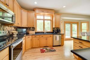 Riverfront Bliss in Rice Lake: Deck, Grill & Hike!