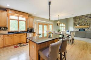Riverfront Bliss in Rice Lake: Deck, Grill & Hike!