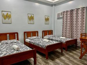 RedDoorz at Gracias Calzada Inn Camiguin