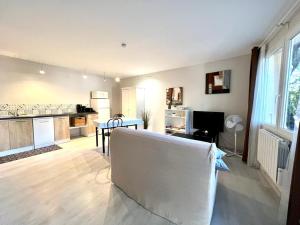 Appartements La Vigne et L'Olivier : photos des chambres