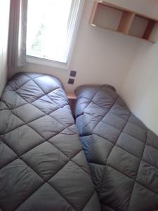 Campings Mobil home Neuf 6 places Climatise : photos des chambres