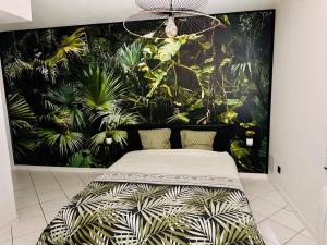 Appartements Le Tropical sublime ambiance Jungle proche Metz : photos des chambres