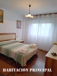 Piso al lado de la estación de tren y de la playa, con dos plazas de garage