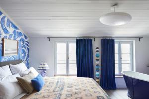 B&B / Chambres d'hotes Maisons 322 - La Flamboyante : photos des chambres