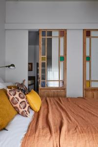 B&B / Chambres d'hotes Maisons 322 - La Flamboyante : photos des chambres