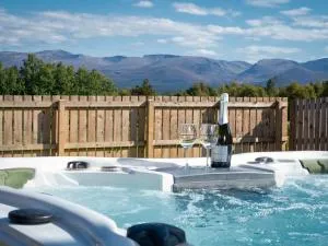 Snowmass Lodge - hot tub in Aviemore - Eil