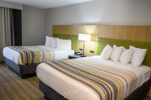 Queen Room with Two Queen Beds room in Country Inn & Suites by Radisson Greenfield IN