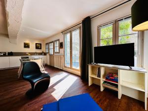 Appartements Le Concorde - T2 confortable avec terrasse : photos des chambres