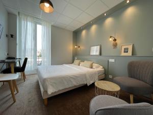 Hotels Cit'Hotel Les Alizes : photos des chambres