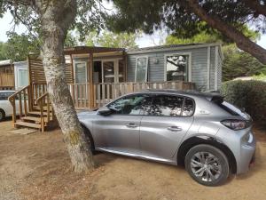 Appartements Mobilhome climatise et ombrage : photos des chambres