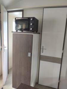 Appartements Mobilhome climatise et ombrage : photos des chambres