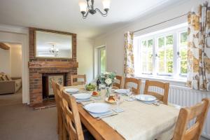 Spacious family cottage with private garden and forest walks