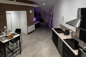 Appartements L'incognito - Romantisme - Vin - Jacuzzi : photos des chambres