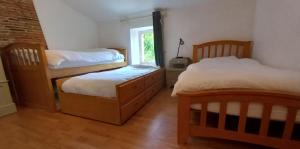 Appartements Gite de la Longue Prairie : photos des chambres