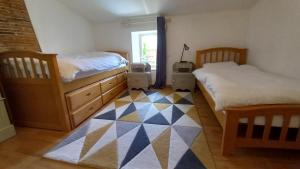 Appartements Gite de la Longue Prairie : photos des chambres