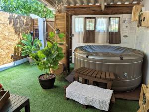 Appartements Studio 19 cosy avec jacuzzi et jardinet privatifs : photos des chambres