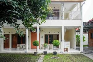 Teratai Guesthouse Mitra RedDoorz near Tugu Yogyakarta