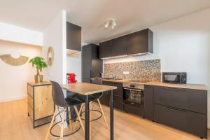 Appartements 2 bedroom balcony near tram station : photos des chambres