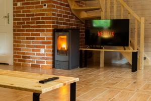 Dom Stary Młyn nad strumieniem z możliwością dostępu do sauny, gorącej beczki, basenem