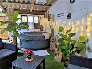 Appartements Studio 19 cosy avec jacuzzi et jardinet privatifs : photos des chambres