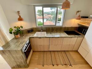 Appartements Le Must du Gouf, au coeur de Capbreton a supp : photos des chambres