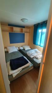 Chalets La Maison du bonheur Mobil-home camping 3 etoiles Paris a 45 Km : photos des chambres