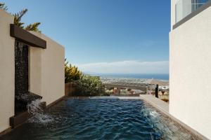 Honeymoon Suite with Outdoor Heated Pool and Sea View room in Apikia Santorini