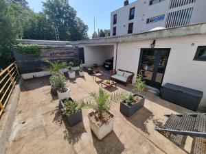 Appartements Loft avec grande terrasse et parking, proche Lyon Cite Internationale : photos des chambres