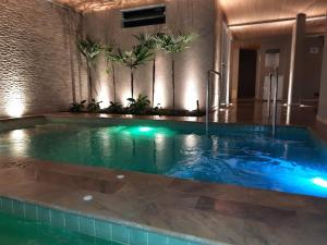 Apartamento com piscina aquecida e churrasqueira