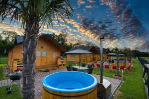 Nocleg Zator Domki Paradise Pod Palmami