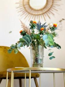 Appartements Sunrise - Gare & centre ville : photos des chambres