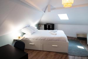 Appartements Charmant duplex : photos des chambres