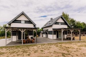 Domki Sasino - nowe, komfortowe, całoroczne domki nad morzem "Ranczo Sasino"