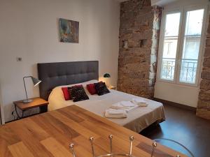 Studio de 25m2 - Extra centre - À 5 min à pied des plages - Commerces et restaurants sur place - Clim - Wifi - EXCEPTIONNEL