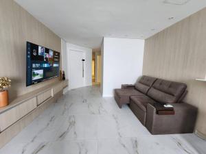 Sonho de apartamento pé na areia