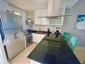 Penthouse Chic en Cana Rock Condos #23