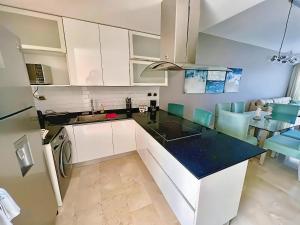 Penthouse Chic en Cana Rock Condos #23