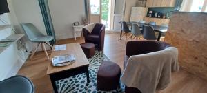 Appartements Le Logis de la Place : photos des chambres