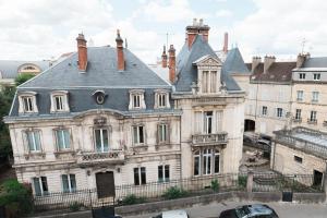 Appartements Le Devosge : photos des chambres