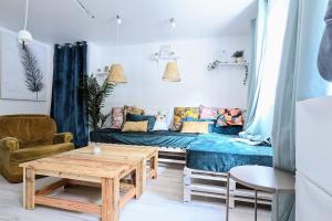 Appartements Cosy Eden 2CH - Foire Expo & Stationnement gratuit : photos des chambres