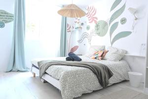 Appartements Cosy Eden 2CH - Foire Expo & Stationnement gratuit : photos des chambres