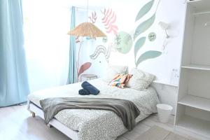 Appartements Cosy Eden 2CH - Foire Expo & Stationnement gratuit : photos des chambres