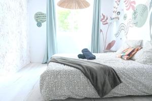 Appartements Cosy Eden 2CH - Foire Expo & Stationnement gratuit : photos des chambres