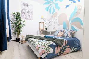Appartements Cosy Eden 2CH - Foire Expo & Stationnement gratuit : photos des chambres