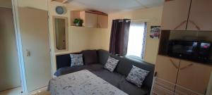 Campings Bungalow familial dans camping calme et verdoyant : photos des chambres