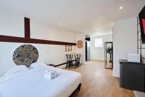 Appartements NG SuiteHome Point Central : photos des chambres