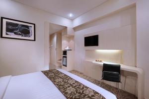Quest San Denpasar by ASTON