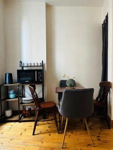 Appartements Chaleureux T1 au coeur de Clermont-Ferrand : photos des chambres